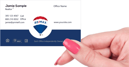 Hand holding business card - Remax Miracle Network business card