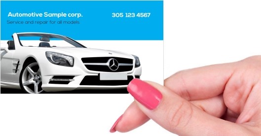Hand holding business card -  Automotive body shop business card