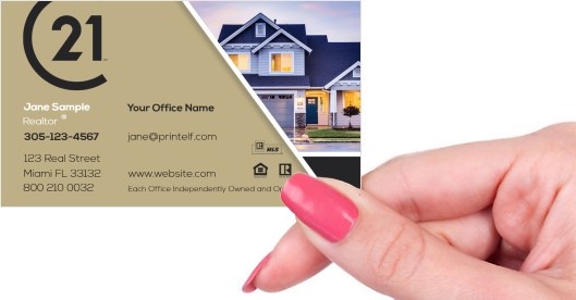 Hand holding business card -  Century 21 Housing business card