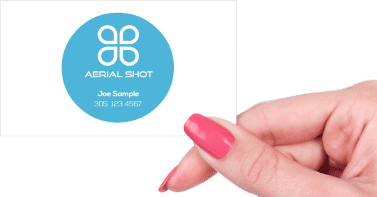 Hand holding business card - Aerial Shot business card