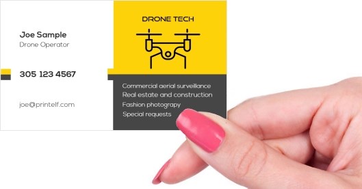 Hand holding business card -  Drone business card